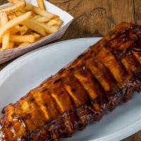 Full Rack Baby Back Ribs · Full Rack of our World Famous Baby Back Ribs served with side of choice.