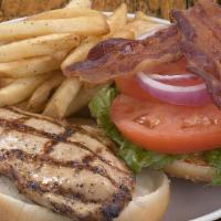 Grilled Chicken Sandwich · Grilled Chicken Sandwich served with fillings and side of choice.