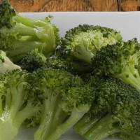 Broccoli · Side portion of steamed broccoli with butter.