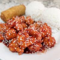 Sesame Chicken · Includes pork fried rice pork and shrimp egg roll.