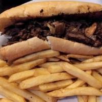 Cheesesteak · Served with fresh sautéed onions, mushrooms, and melted white American cheese all mixed toge...