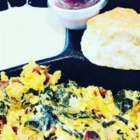 Southern Scramble · 3 eggs scrambled with crispy all-natural nitrate free applewood bacon, spicy vegan collard g...