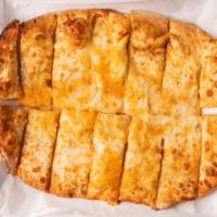 Cheesy Bread · Roasted fresh garlic,mozzarella and cheddar cheese on our fresh baked dough.Comes with Marin...