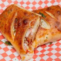 Meat Lover Stromboli · Pepperoni, sausage, ham, and bacon.