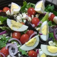 Chef Salad · Fresh romaine, tomatoes, onions, green peppers, black olives, chicken, ham and boiled eggs.