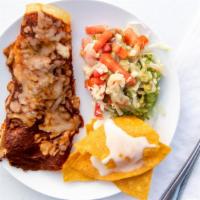 Enchiladas · Corn tortilla filled with beef, chicken, cheese, or beans. Topped with our enchilada sauce a...