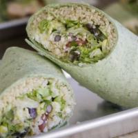 Southwestern Wrap · Romaine lettuce, tomatoes, quinoa, black beans, corn, jalapeno, and cilantro on a spinach to...