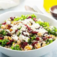 Kale Salad With Quinoa · Chopped kale, quinoa, dried cranberries, toasted almonds, goat cheese, Meyer lemon vinaigret...