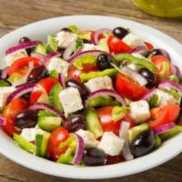 Greek Quinoa Salad · Romaine, quinoa mixed with cucumber, celery, cherry tomatoes, kalamata olives, crumbled feta...