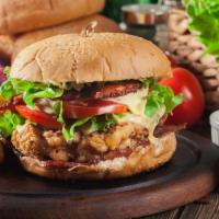Nashville Chicken Sandwich · Delicious sandwich served on a toasted bun and topped with spicy crispy fried chicken, coles...