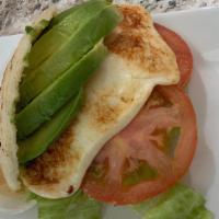 Vegetarian Arepa · Tomatoes, avocado, lettuce,  grilled white cheese