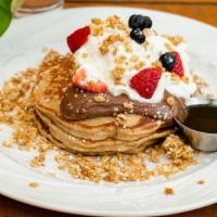 Nutella Pancake · Vegetarian. Topped with assorted berries + chocolate drizzle.