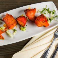 Chicken Tikka Entrée · Boneless cubed chicken breast marinated in special sauce with yogurt, peeled tomato, and her...
