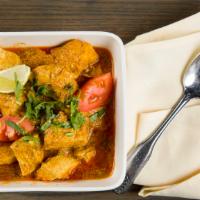 Chicken Curry · Mildly spiced with turmeric, onion, ginger, garlic, coriander, and cumin --- in a special cu...