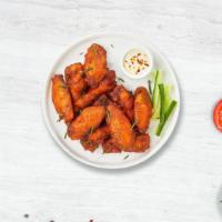 Wingsanium · Fresh chicken wings baked with salt and pepper.