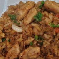 Chaufa De Pollo · Peruvian fried rice sauteed with chicken, sesame oil, soy, and oyster sauce. A mix of Peruvi...