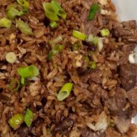 Chaufa De Carne  · Peruvian fried rice sauteed with tender beef cubes, sesame oil, soy, and oyster sauce. A mix...