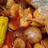 Shrimp Boil · One Pound of Headless shrimp Seafood Boil comes with one corn and two potatoes.