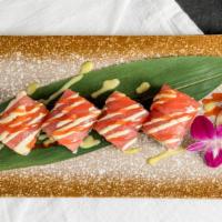 Lava Roll · Spicy. Spicy tuna, avocado, tempura crunch, wrapped with tuna, wasabi mayo, sweet chili sauce.