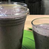 Deep Purple · Frozen banana, frozen blueberries, chocolate protein powder, almond milk, peanut butter.
