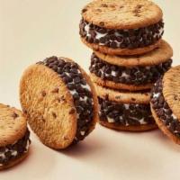 Chipsters (6-Pack) · Soft serve vanilla ice cream sandwiched between two chocolate chip cookies.