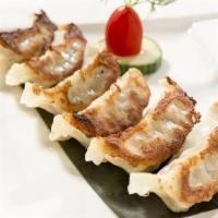 Gyoza · eight piece of pan fried deep fried or steamed dumpling (Pork, vegetable).