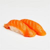 Salmon Nigiri - 2 Piece · Two pieces of salmon over pressed sushi rice.