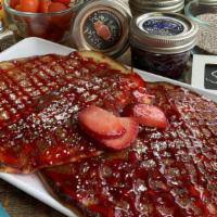 Strawberry Pancake · Strawberry glaze, strawberries, & powdered sugar.