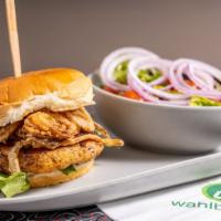 Jenn'S Chicken · 600 cal. Marinated seared chicken breast, caramelized onions, crispy onions, lettuce, and ho...