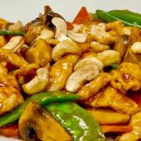 Cashew Chicken · Stir-fry with mushrooms, carrots, snow peas and water chestnuts in a garlic soy sauce.