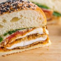 Chicken Parmigiana Hot Sub · Delicious sandwich made with seasoned chicken parmigiana and melted cheese.