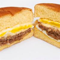 Sausage Egg And Cheese · Two fried eggs, pork sausage and American cheese served on a kaiser roll.