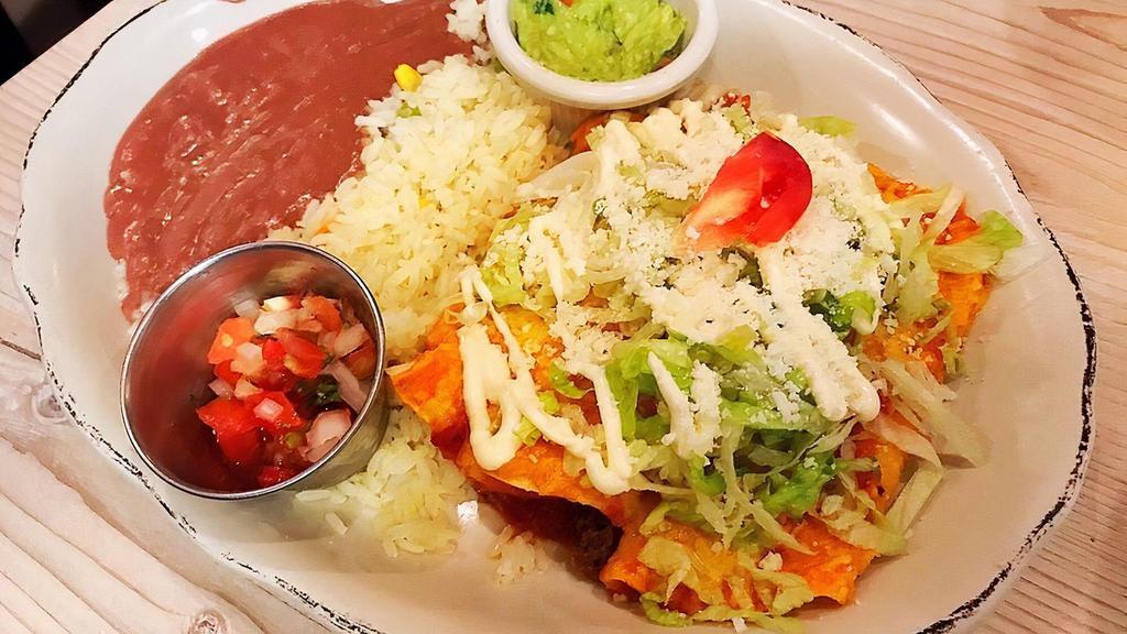 Trio Mexican Enchiladas With Red Sauce Or Salsa Verde · One steak, one chicken and one cheese enchilada. Served with a side of guacamole and pico de gallo.