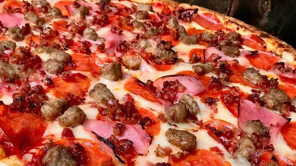 Meat Lovers Pizza · Pepperoni, bacon, italian sausage, ground beef and ham.