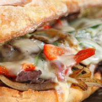 Philly Cheesesteak Hot Sub · Made with red onion, green peppers, mushrooms and mayonnaise.
