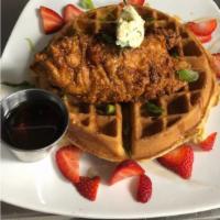 Hot Chicken & Waffle · A fried chicken breast, honey-hot sauce & herb butter on a waffle with maple syrup.