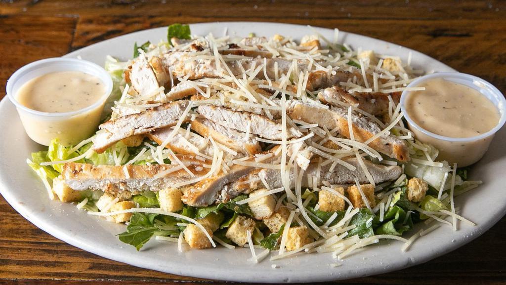 Chicken Caesar Salad · Chicken, Romaine lettuce and croutons dressed with Caesar salad dressing.