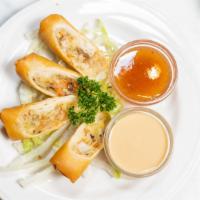 Spring Rolls (2)  · Ground Pork and Shrimp Wrapped in Shanghai Style Egg Roll Wrapper and Fried to Perfection.