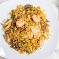 Combination Fried Rice  · Includes chicken, beef and shrimp.