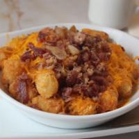 Loaded Tater Tots · Tater Tots, Topped With Bacon & Melted Cheddar Cheese.