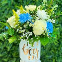It'S A Boy Or Girl · Welcome a “new arrival” with this cheerful flower arrangement in a white ceramic vase and go...