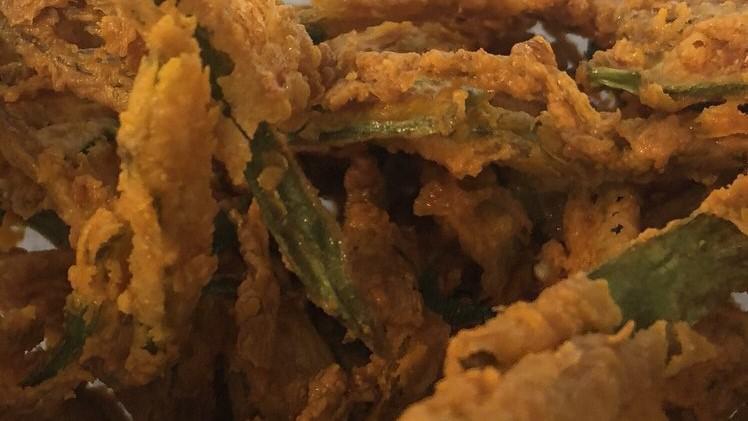 Kurkuri Bhindi Fries · Area Southern specialty meets our Indian twist Matchstick tried Okra tossed to perfection with our special seasoning.