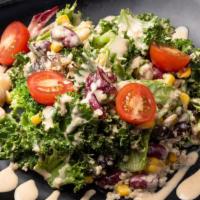 Jinya Quinoa Salad · baby greens, kale, broccoli, whie quinoa, kidney and garbanzo beans tossed with sesame dress...
