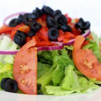 Garden Greens · Romaine lettuce, tomatoes, onions, roasted peppers black olives