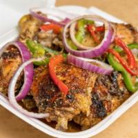 Oven-Baked Chicken  · Marinated with mojo, lemon, chicken base spicy creole seasoning.