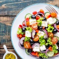 Greek Salad · Crisp romaine lettuce, cucumbers, cherry tomatoes, red onion, black olives and feta cheese. ...