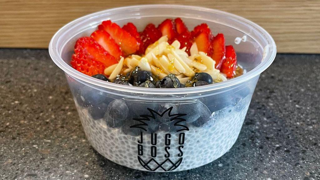 Chia Pudding · Chia pudding made with  unsweetened coconut milk and organic chia seeds. Topped with strawberries, blueberries, shaved almonds and honey. If no honey wanted please advise on notes. size 12oz