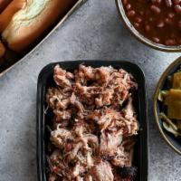 Family Pack · Enough for two adults and two kids: a pound of your choice of smoked meats, buns, two pint-s...