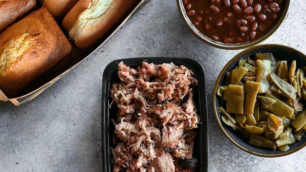 Family Pack · Enough for two adults and two kids: a pound of your choice of smoked meats, buns, two pint-sized sides, and cornbread