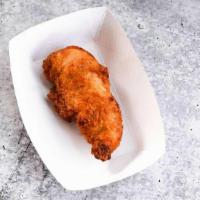 One Nashville Chicken Tender · Hand-battered chicken tender, fried to order and tossed in our spicy Nashville Hot seasoning...